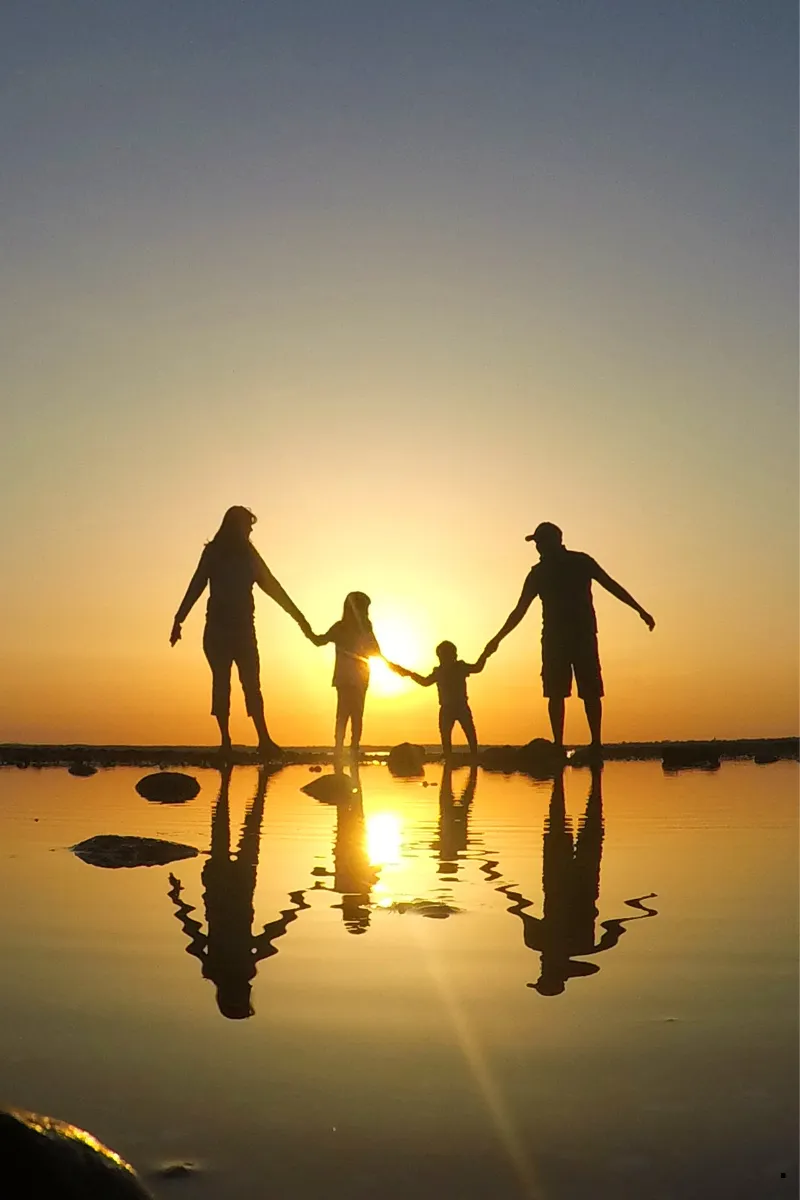 Family silhouette at sunset - Downscale Weight Loss Clinic